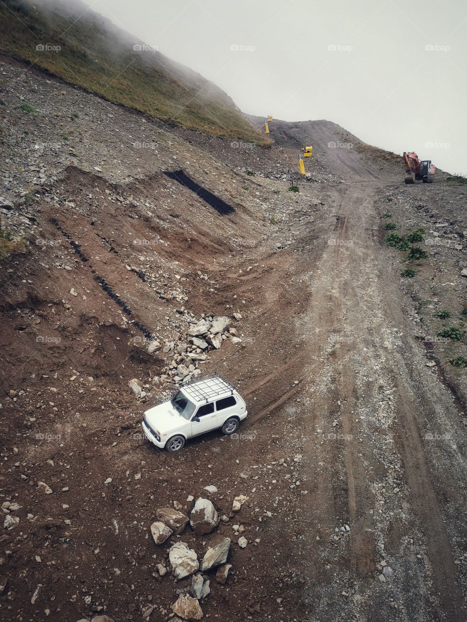 From up to above feet legs mountains hills field nature view eco focus day part sun sunny travel Light reys trip form plant part shades shape beauty greens outdoor freedom happy happiness sandy ground car
