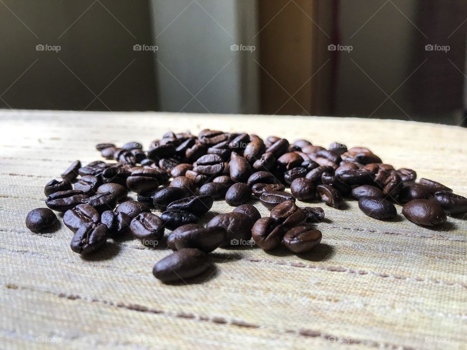 Coffee bean on wooden table 