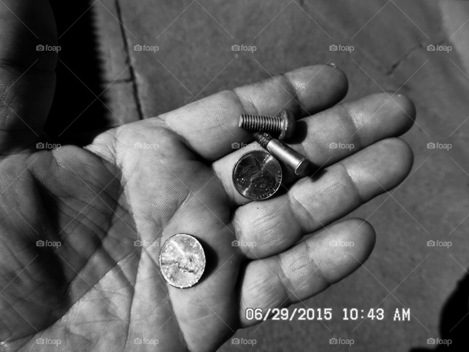 two ✌ pennies and a  bullet. This is a picture of what I found laying on the ground at the car 🚗 wash this morning while I was out exploring