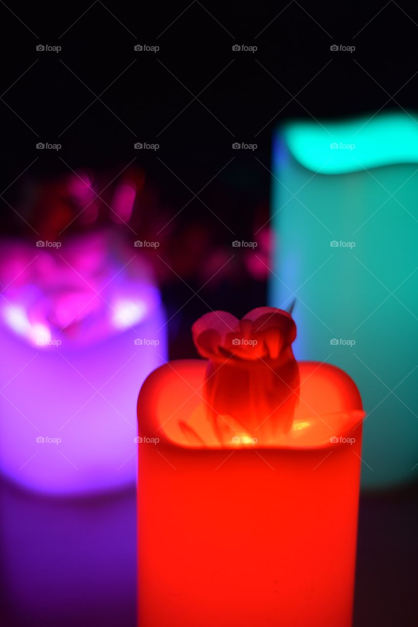 Glowing roses. The composition of the light for Valentine's Day. Roses in a romantic atmosphere and heart bokeh