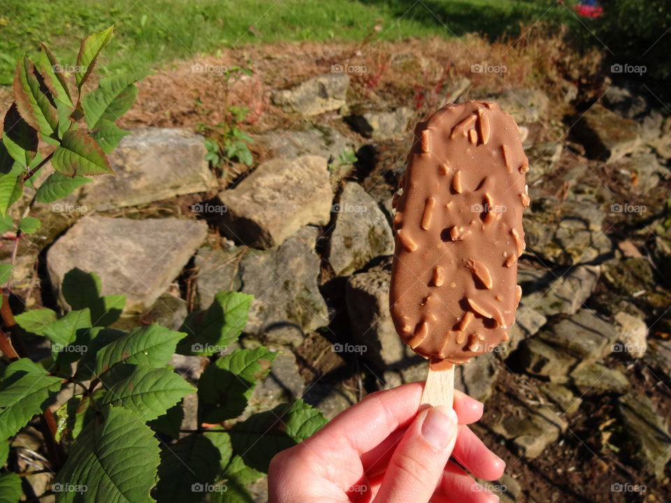 HOLDING ICE CREAM