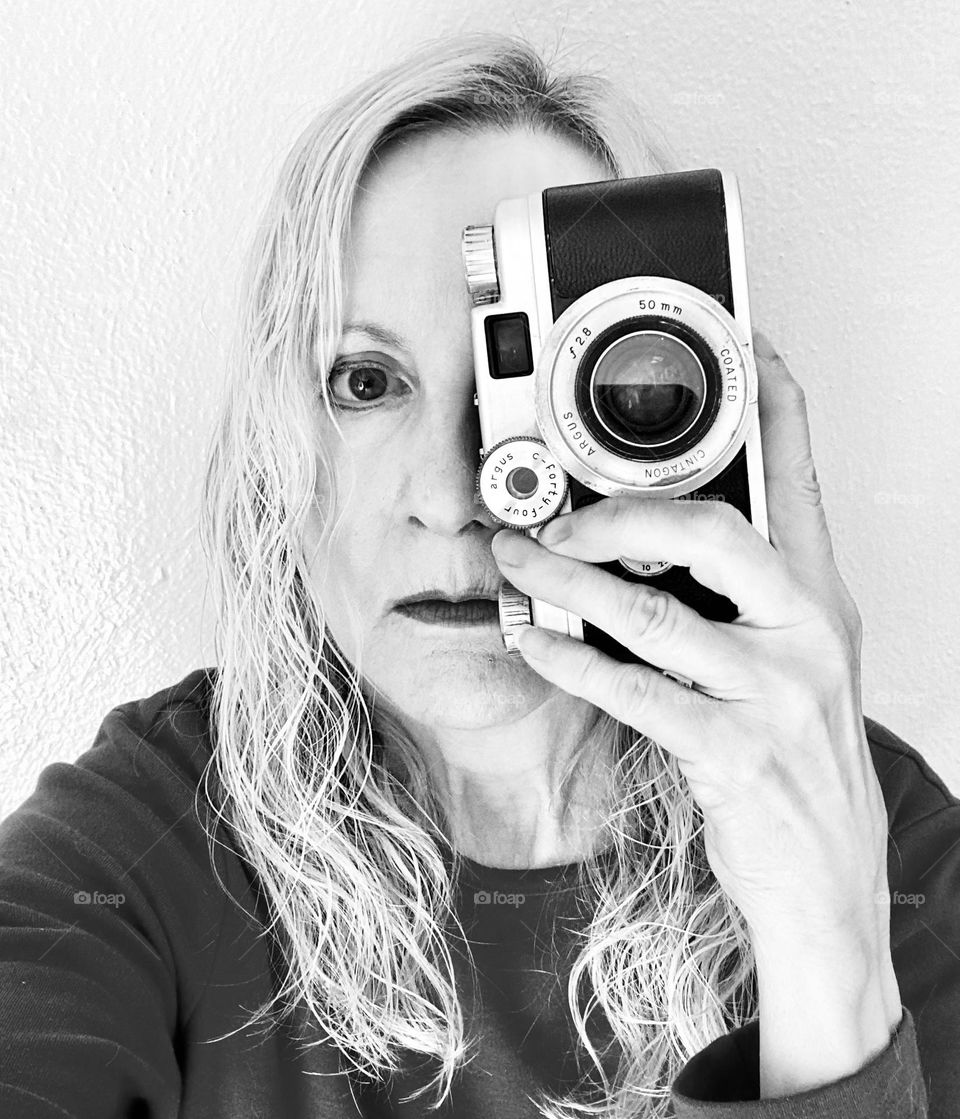 Selfie with camera in black and white