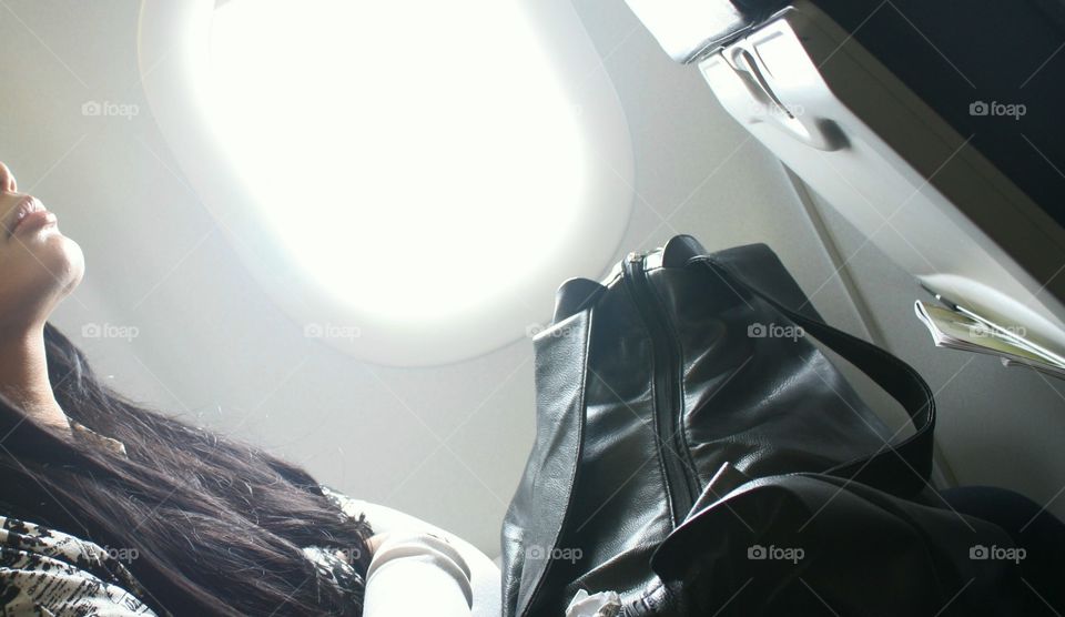 just lean on your seat, relax, no need to close the window, but the door closed is the must.. then let your eyes close, so you can enjoy the flight..