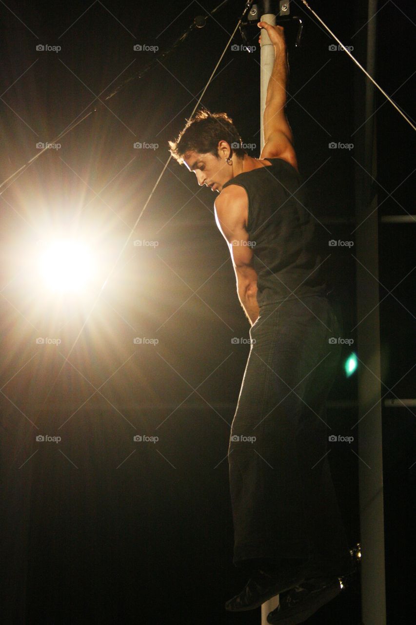 man dance. dancer with the star light in background