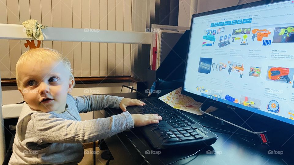 Boy using his computer
