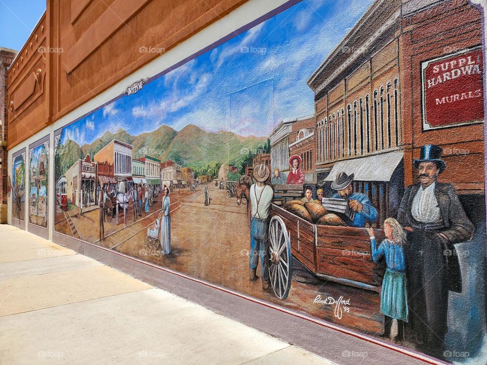 A mural depicts life at a simpler time