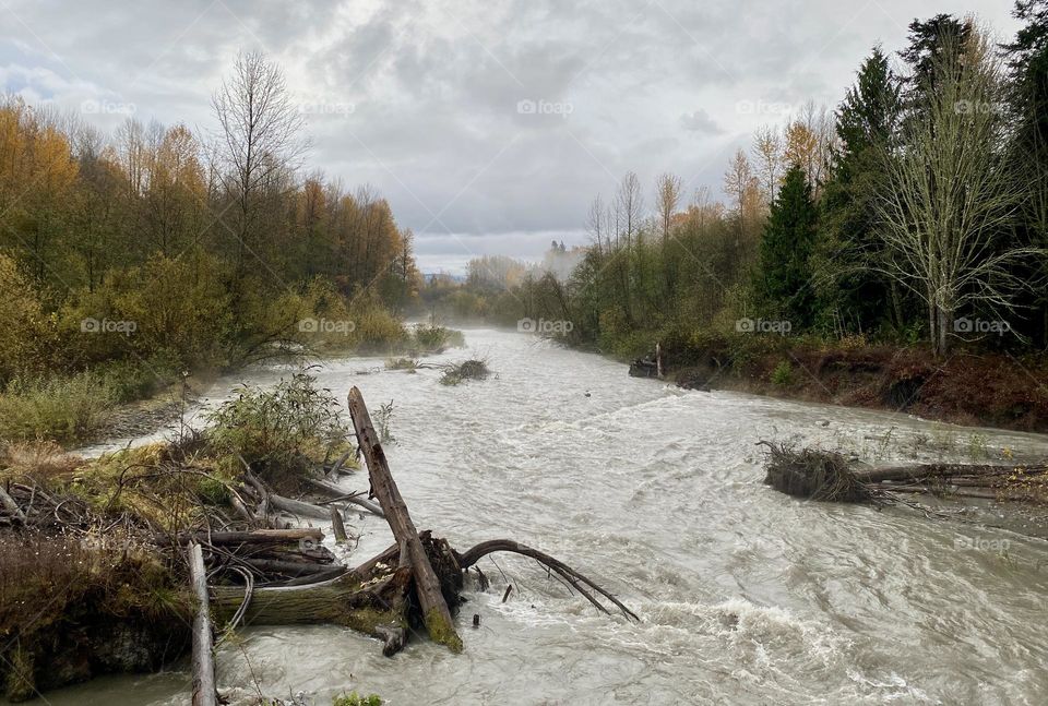 Rushing river from a winter storm