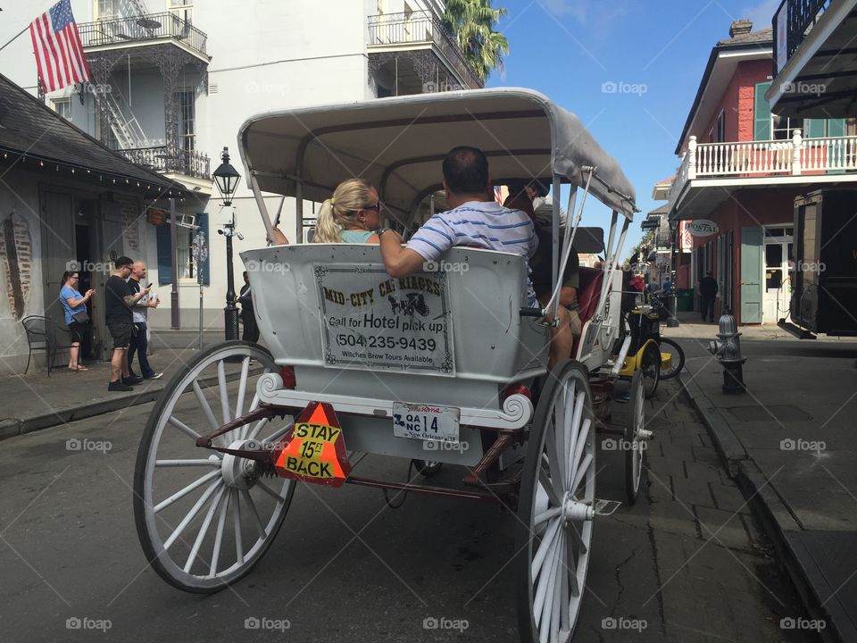 White horse drawn carriage from rear New Orleans 