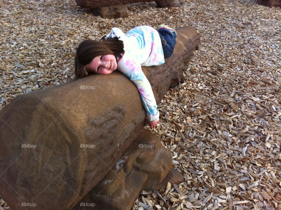 Childhood. My daughter having fun at the playground.