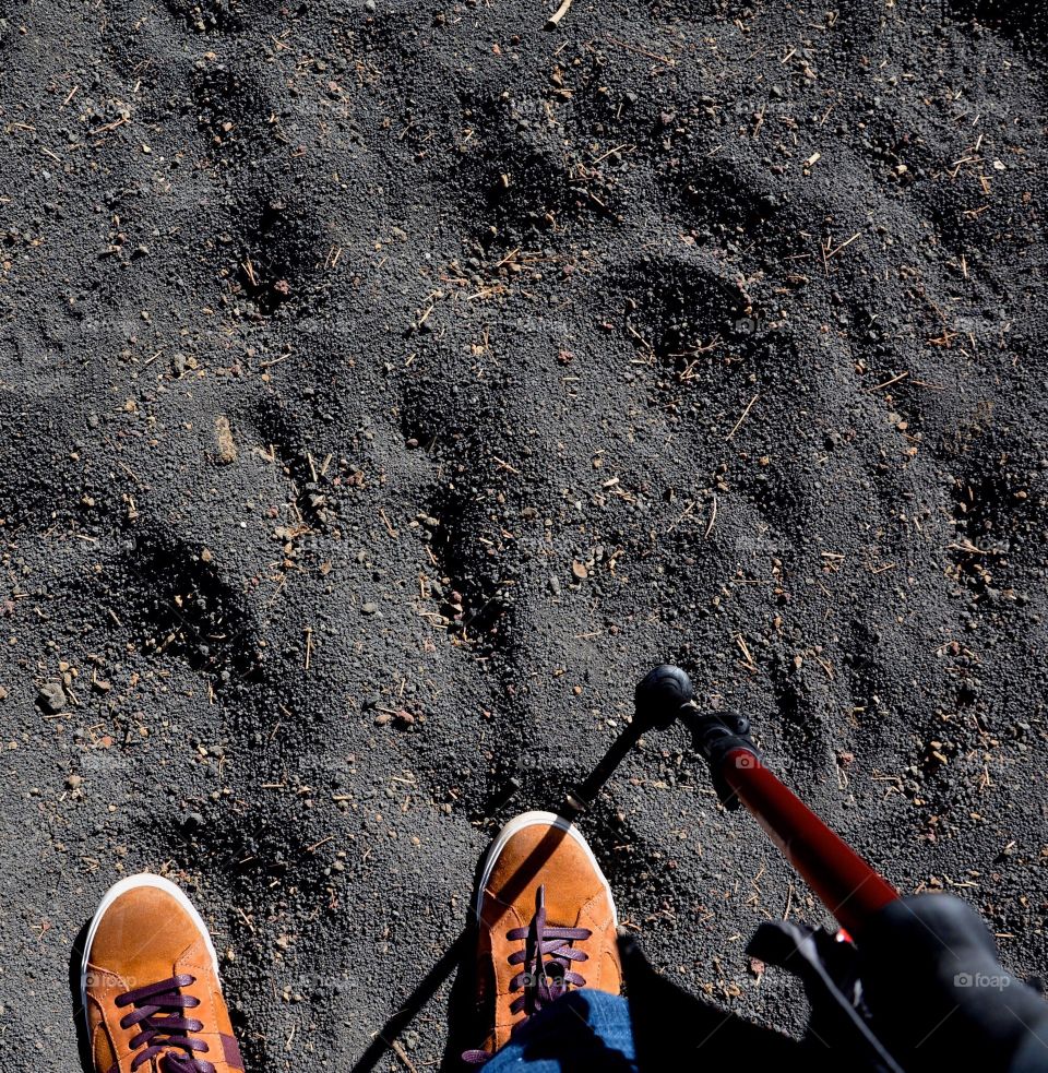 Hiking on sand in a lava field