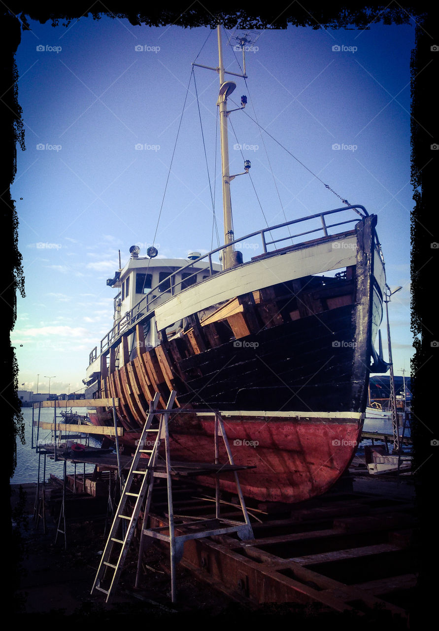 Old fisherman boat in shipyard 