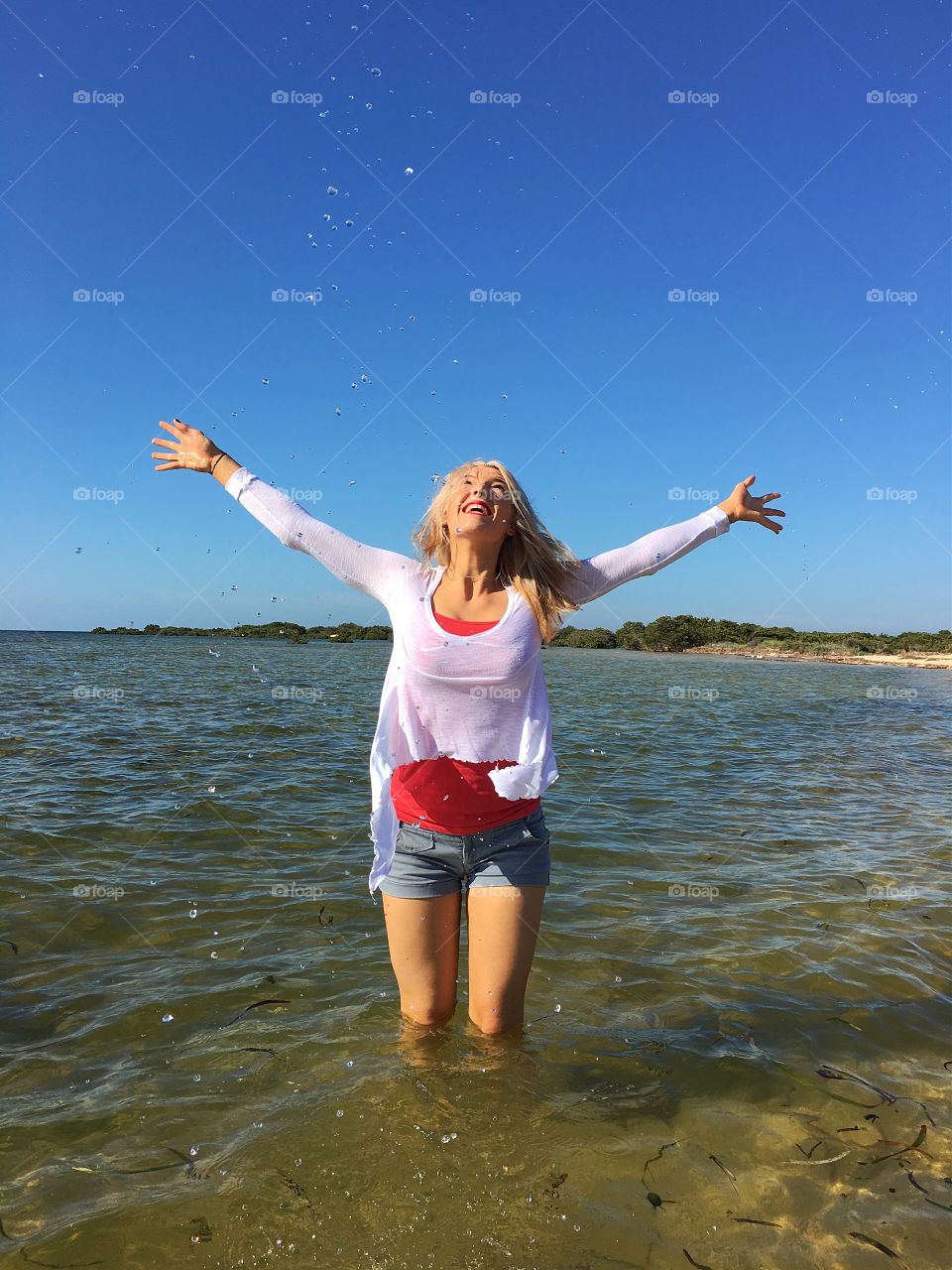 Woman standing in sea