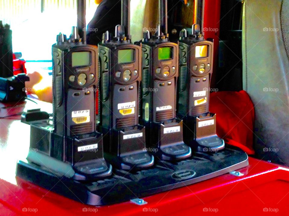 Quad walkies. 4 walkie talkies for 4 fireman in a fire truck 