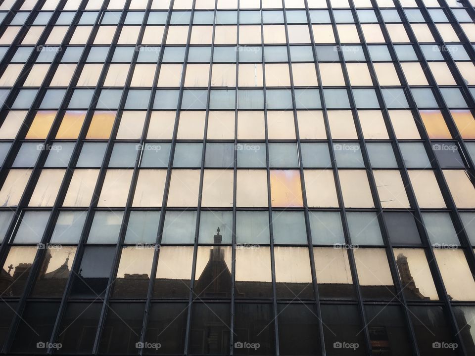 Rectangles Mission... office block showing rectangular windows with a church cross reflection just visible ... for added interest 