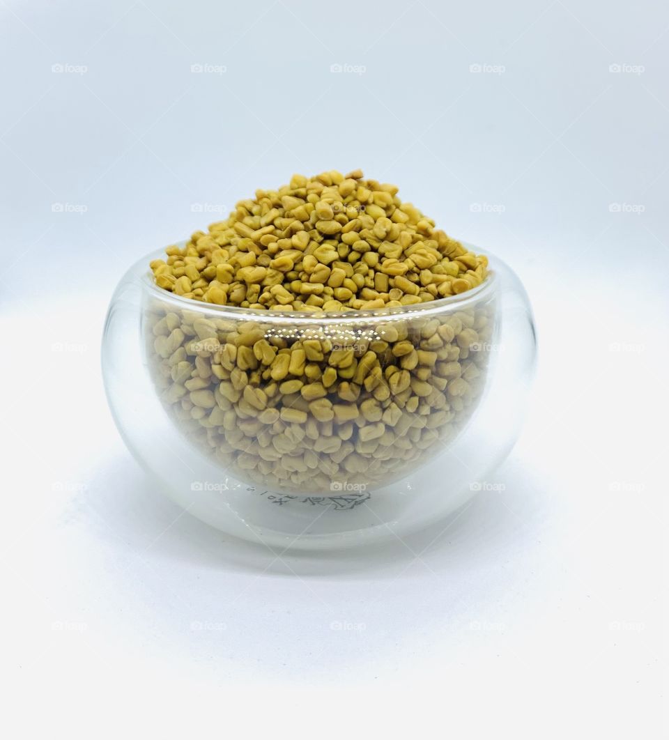 Fenugreek in a double wall glass.