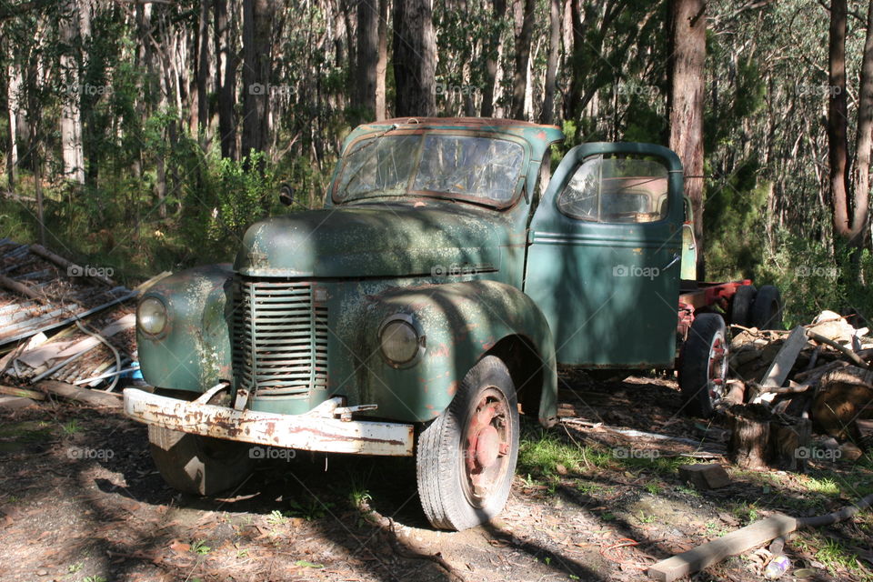 Rusting green international truck 