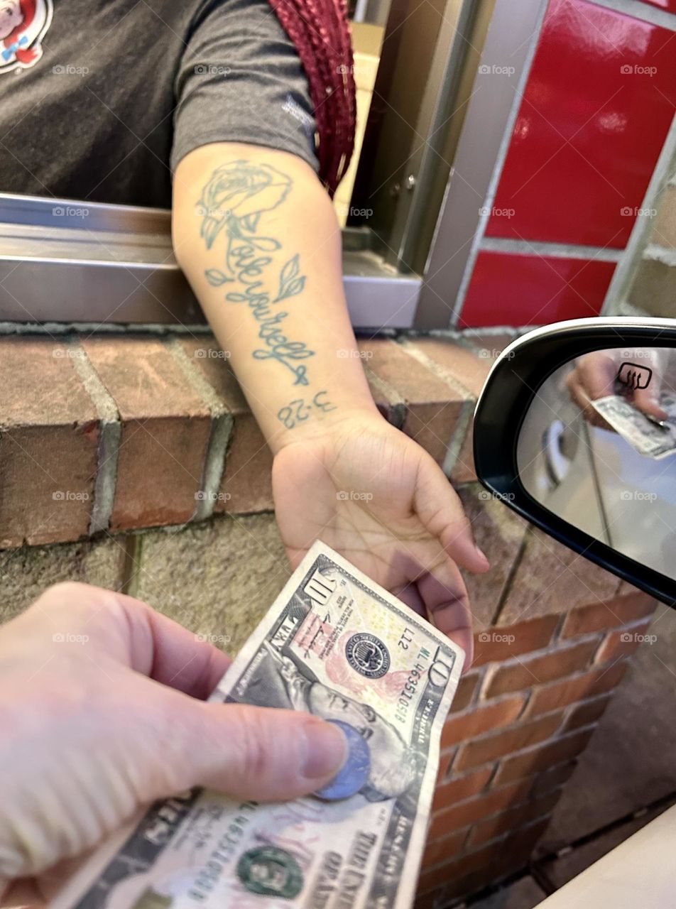 Paying for food at a drive through window