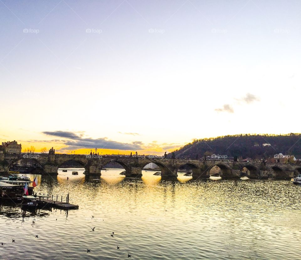 Prague bridge at sunset 