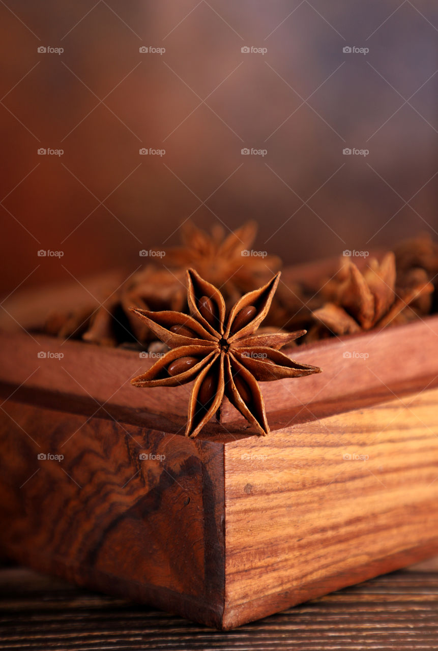 Indian spice star anise in a wooden box
