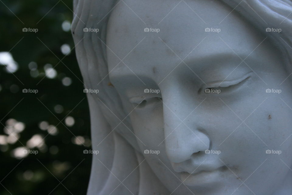 The peace and serenity of the pure alabaster statue is gorgeous