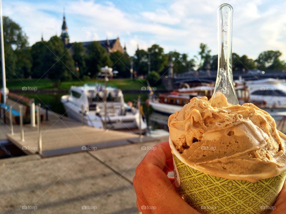 A person holding ice cream