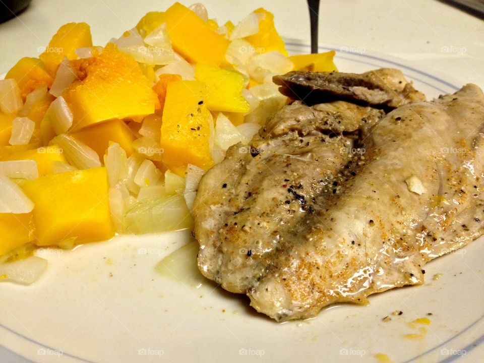 Fish dinner with onions and butternut squash