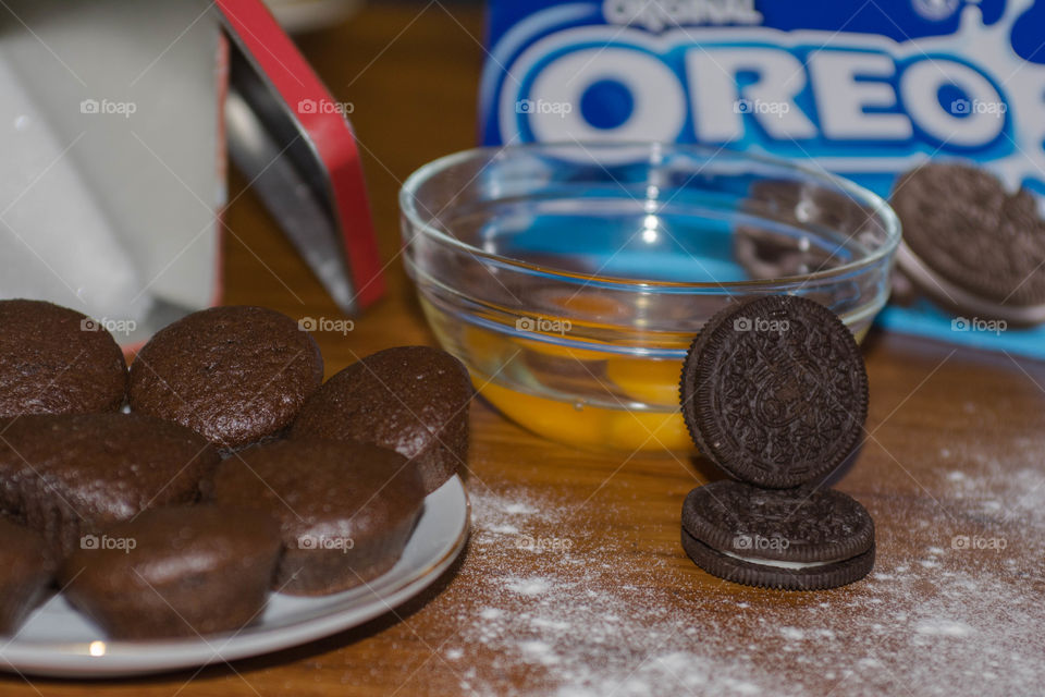 Making oreo cupcakes 