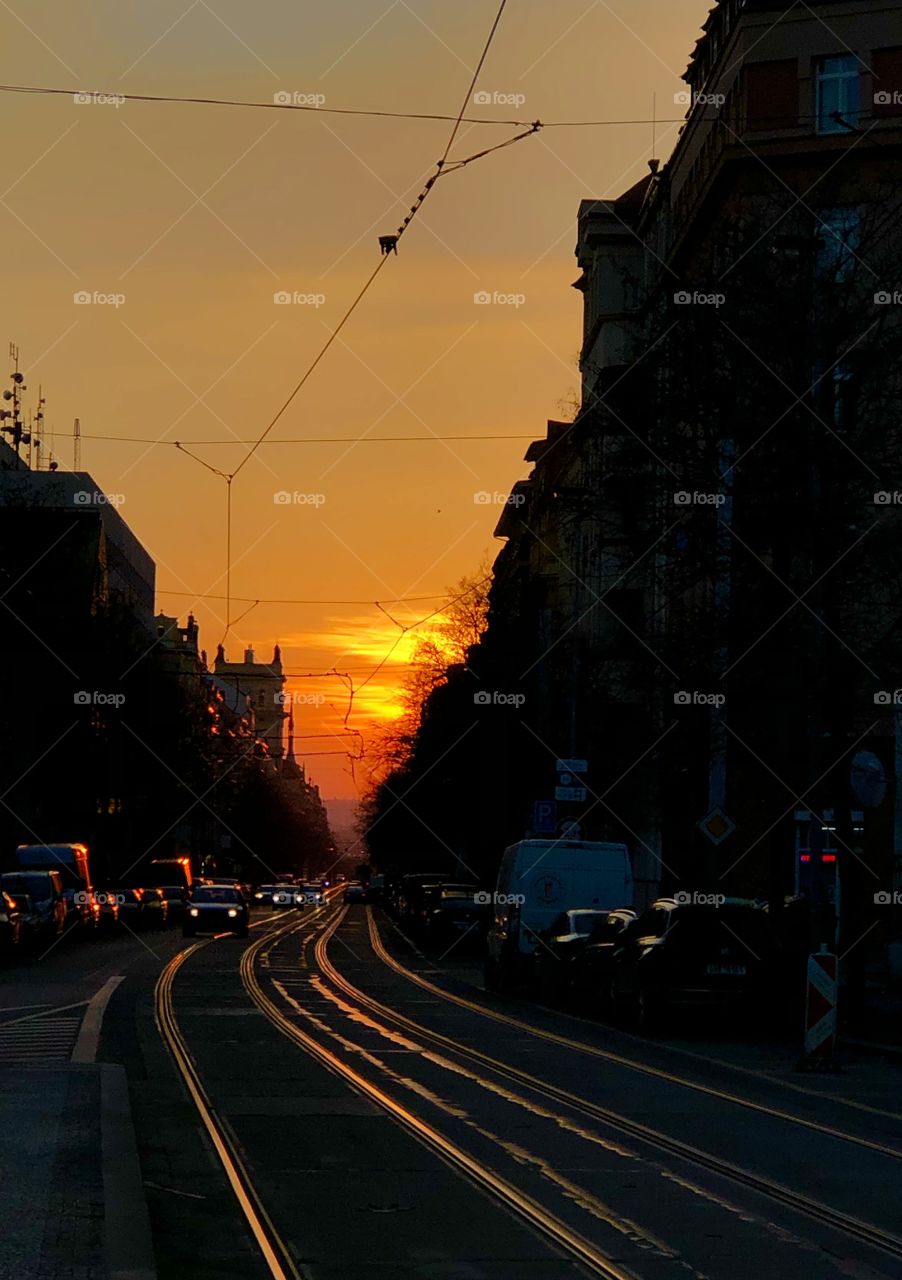 Sunset in the Prague above the tram road