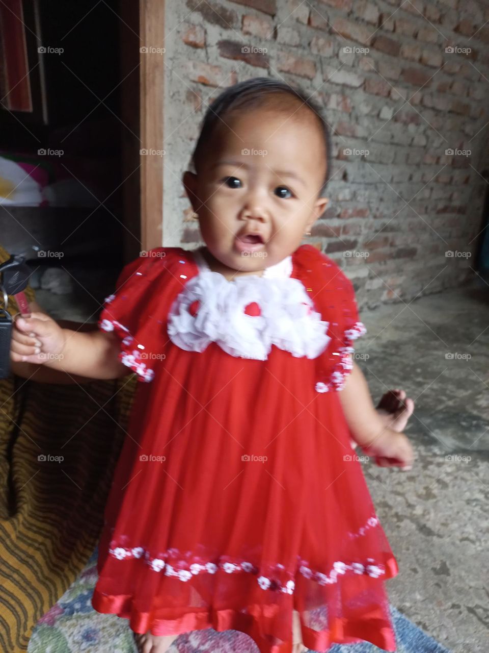 Toddler wearing red
