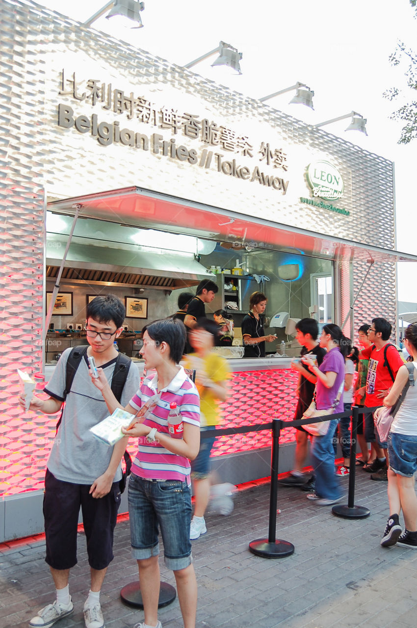 Trying Belgian fries at the Expo 2010 in Shanghai