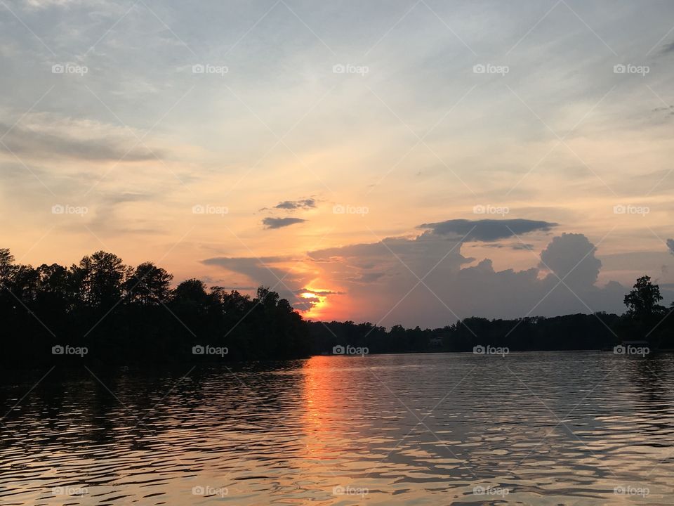 Lakeshore sunset reflection