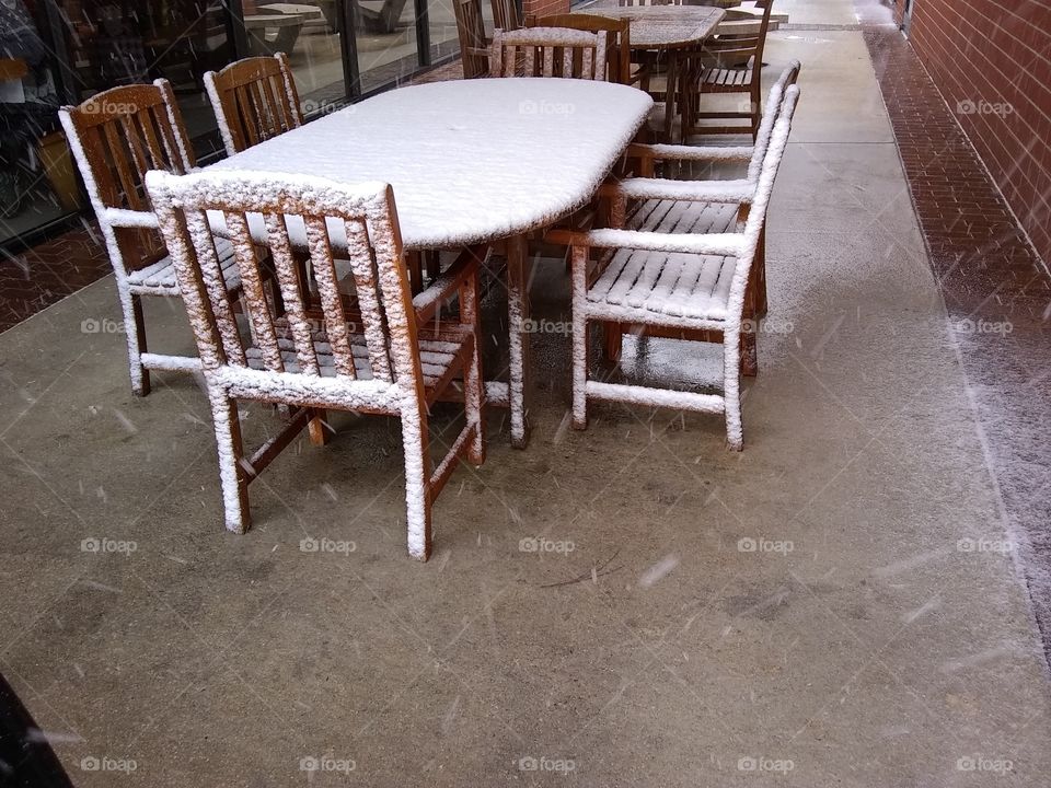 Snowy day covered table and chairs