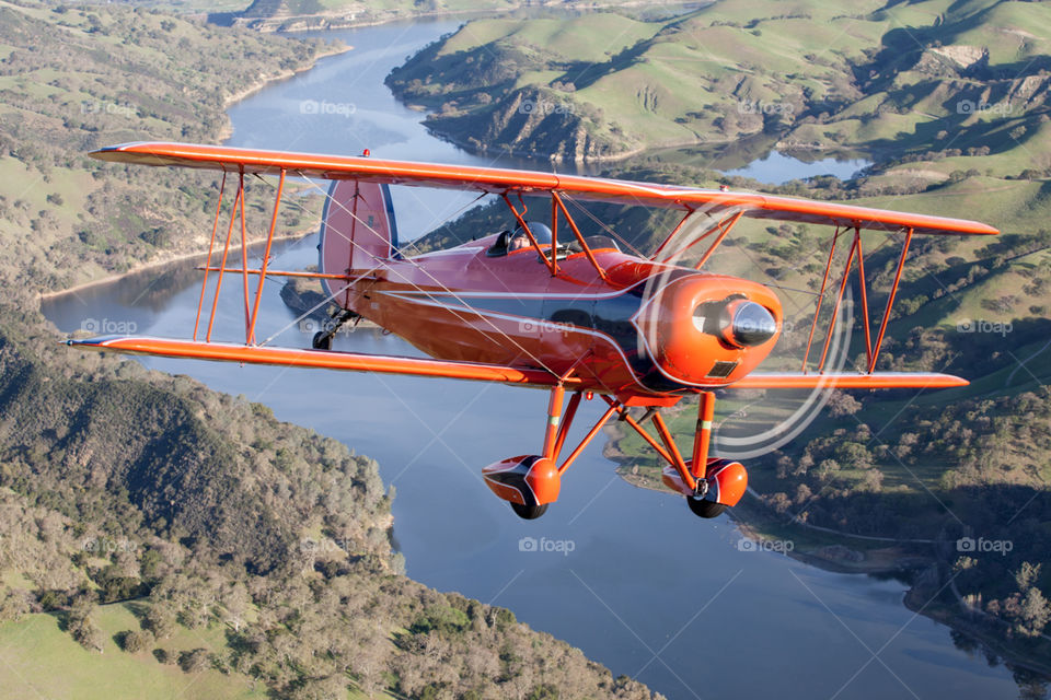 A Great Lakes 2T biplane Air to Air photo with Attitude Aviation in