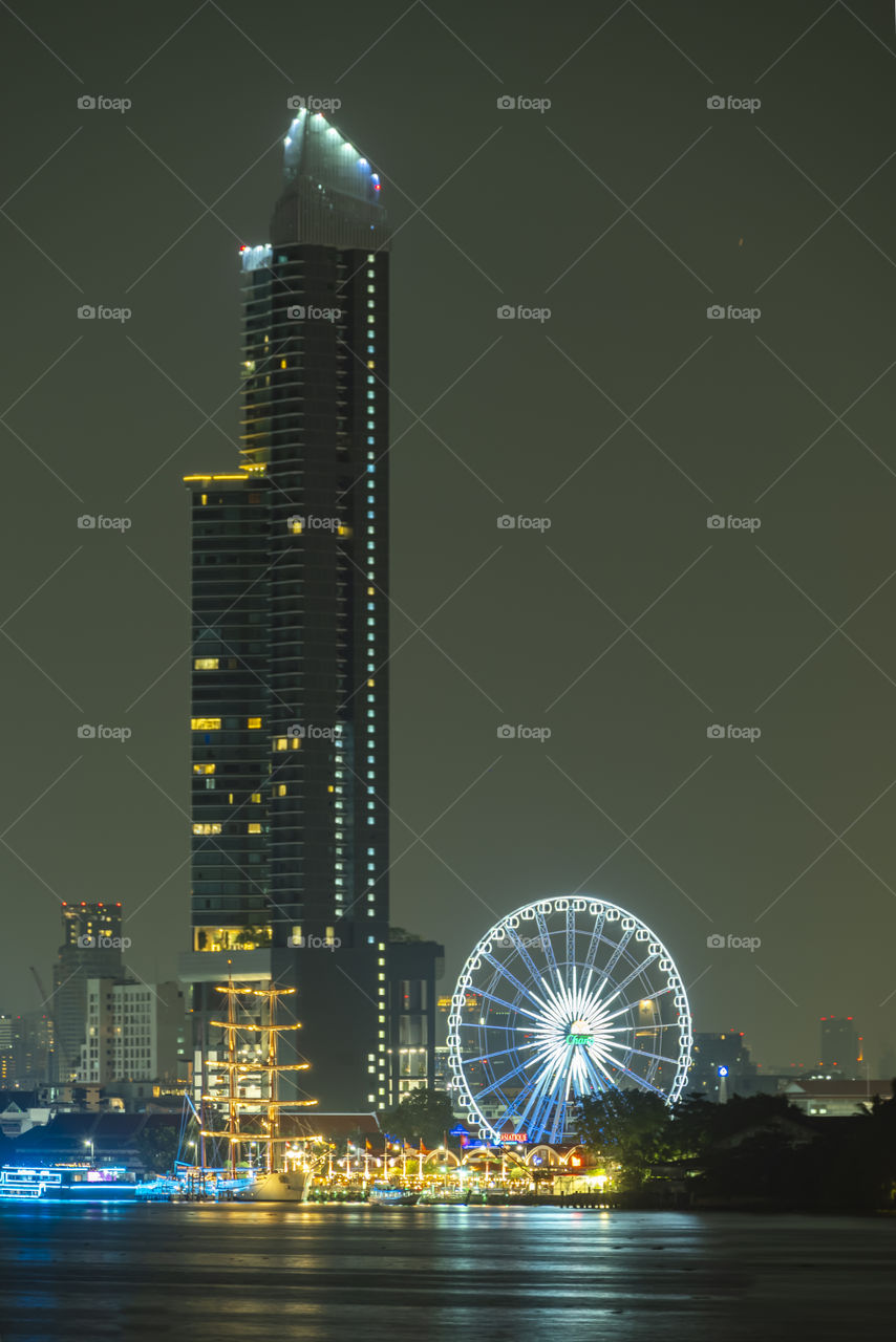 Beautiful night scene of landmark ferris wheel in Bangkok