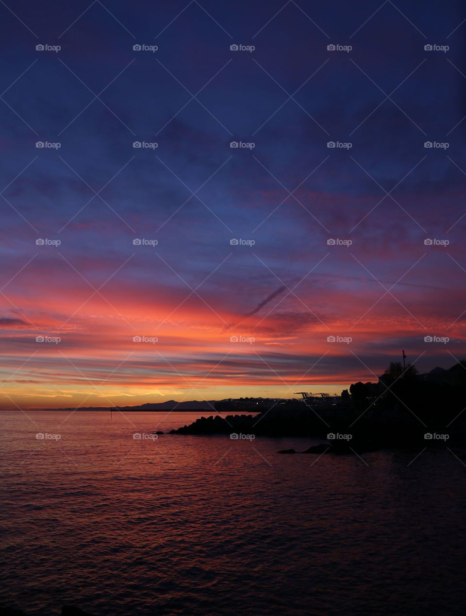 Dramatic sky during sunset at sea