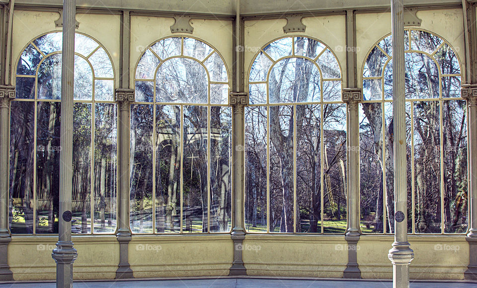 Symmetry between the pillars in the Glass Palace of the Retiro Park in Madrid, Spain.