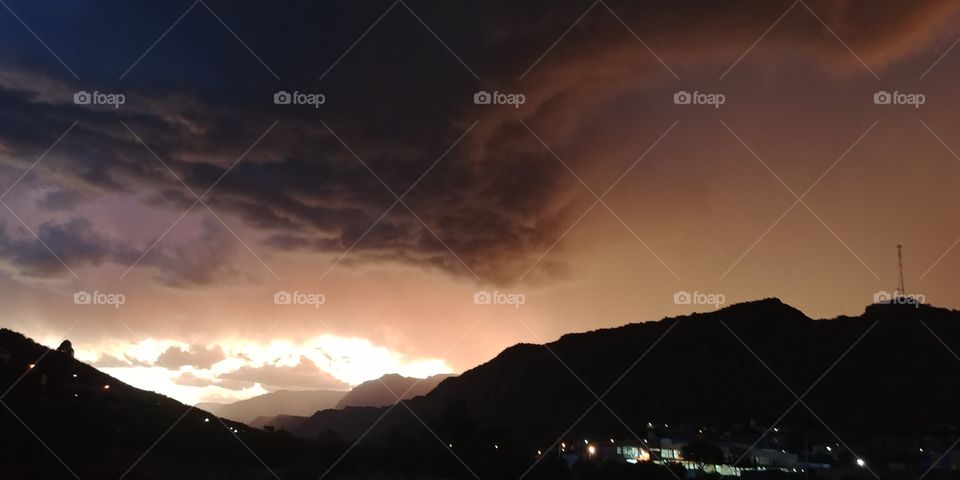 Stormy Bolivian sunset over a city