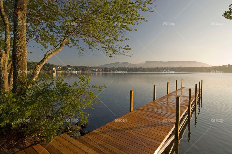 Serene morning on the dock by the lake