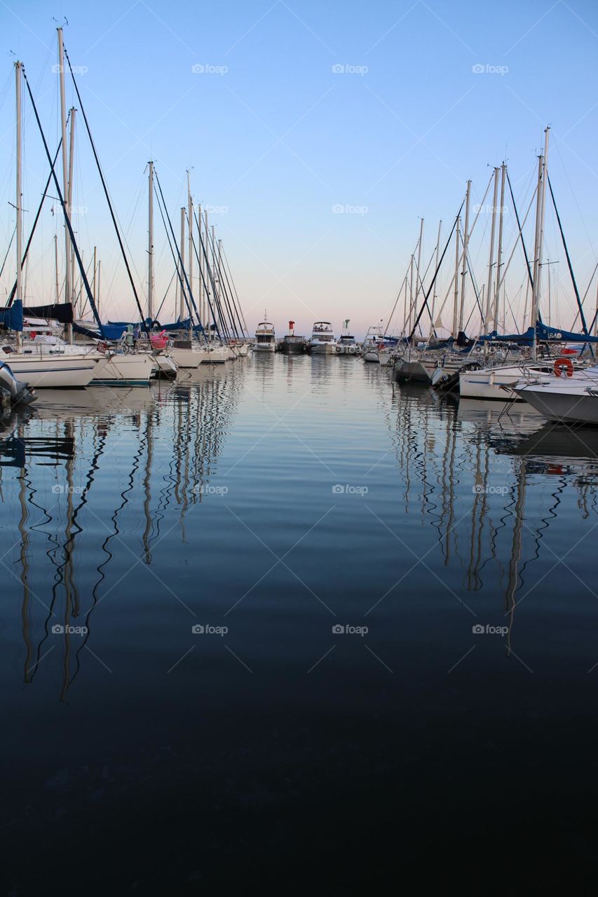 boat masts in the harbor