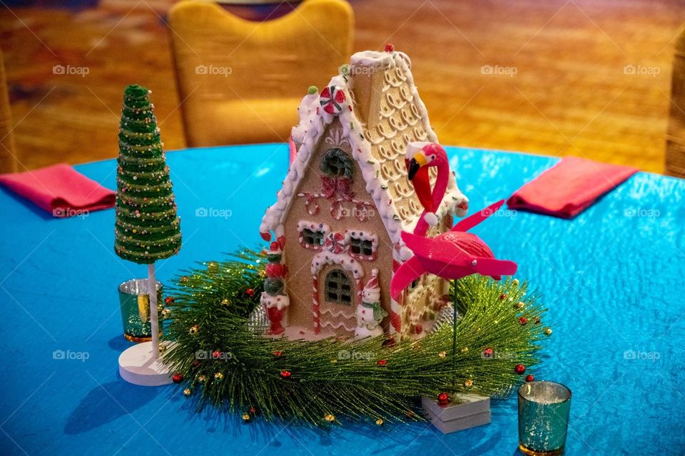 Gingerbread house Christmas centerpiece for a festive holiday party event 