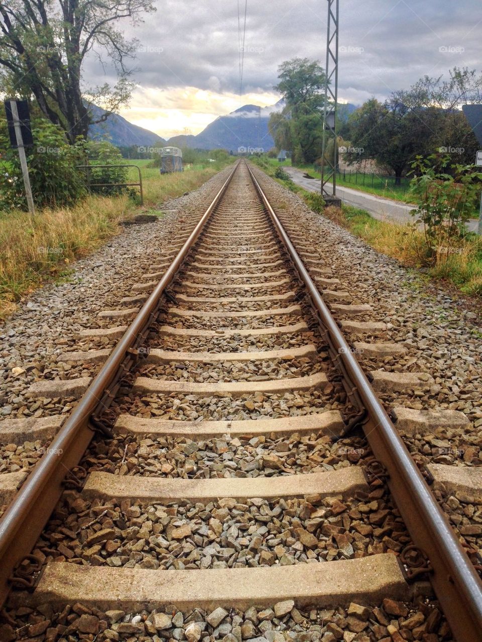 Railroad track passing through field