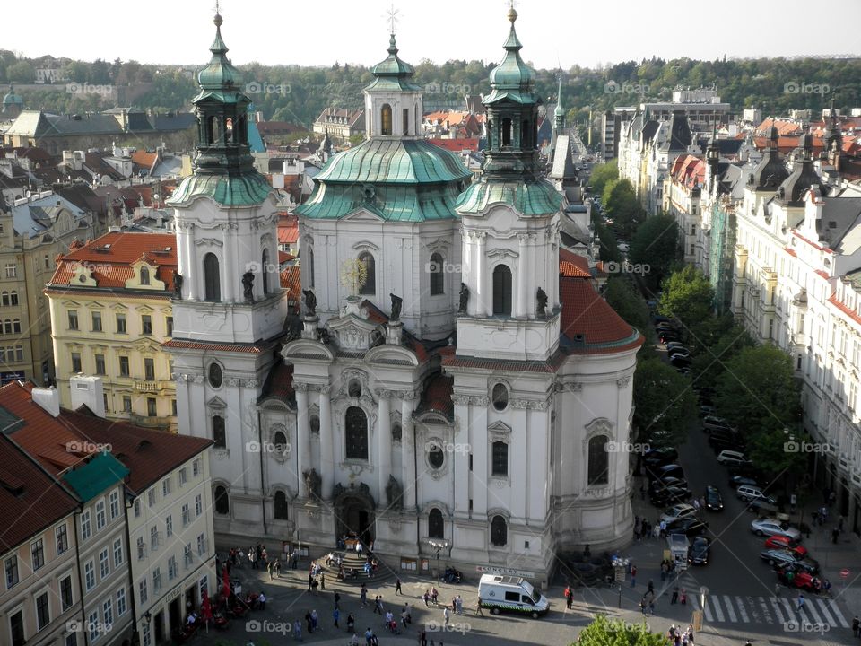 View of Church of St Nicholas and the city of Prague from Old Town Hall Tower