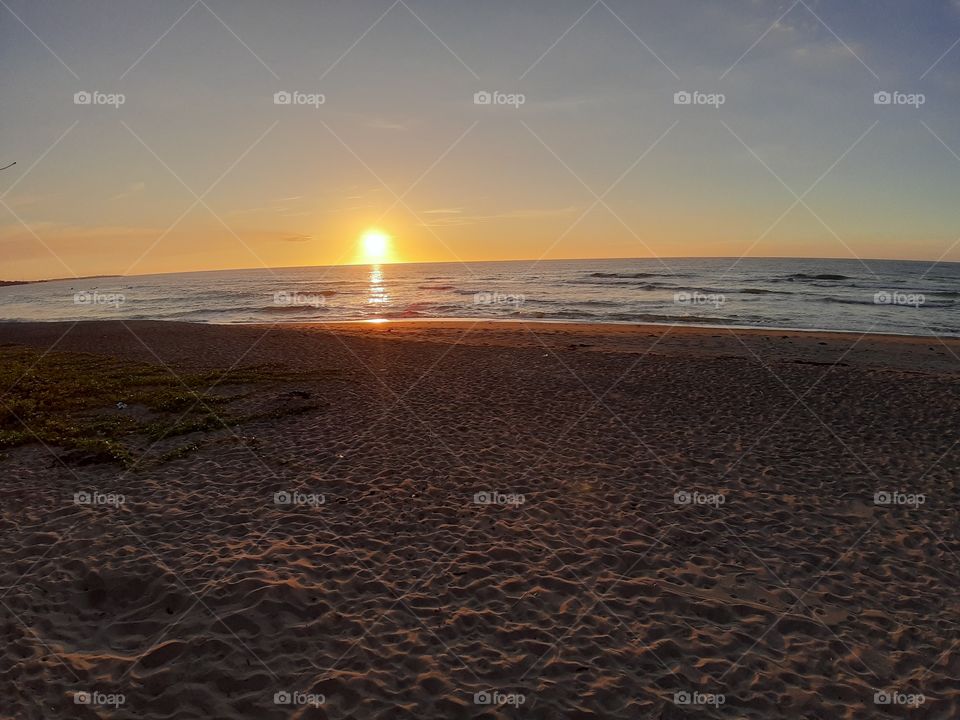Sunset over the restless sands.