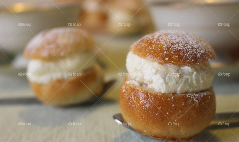 Mini pastry on a tea spoon.