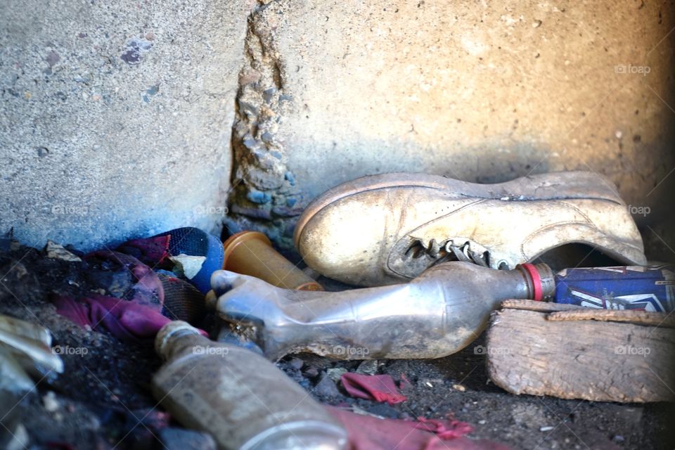 Spring Clean Up. Remnants of the homeless under the railroad tracks 