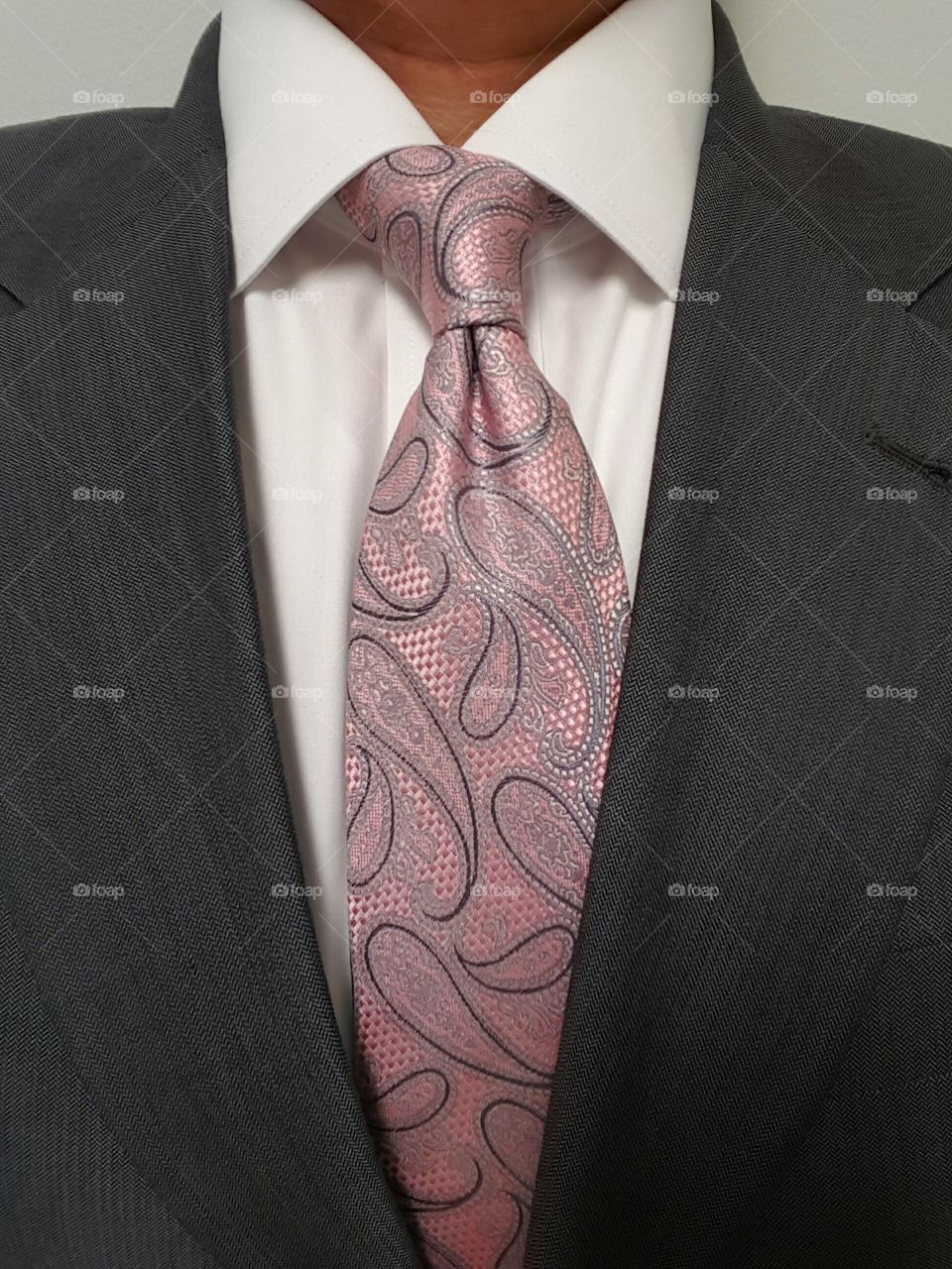 Man with pink tie