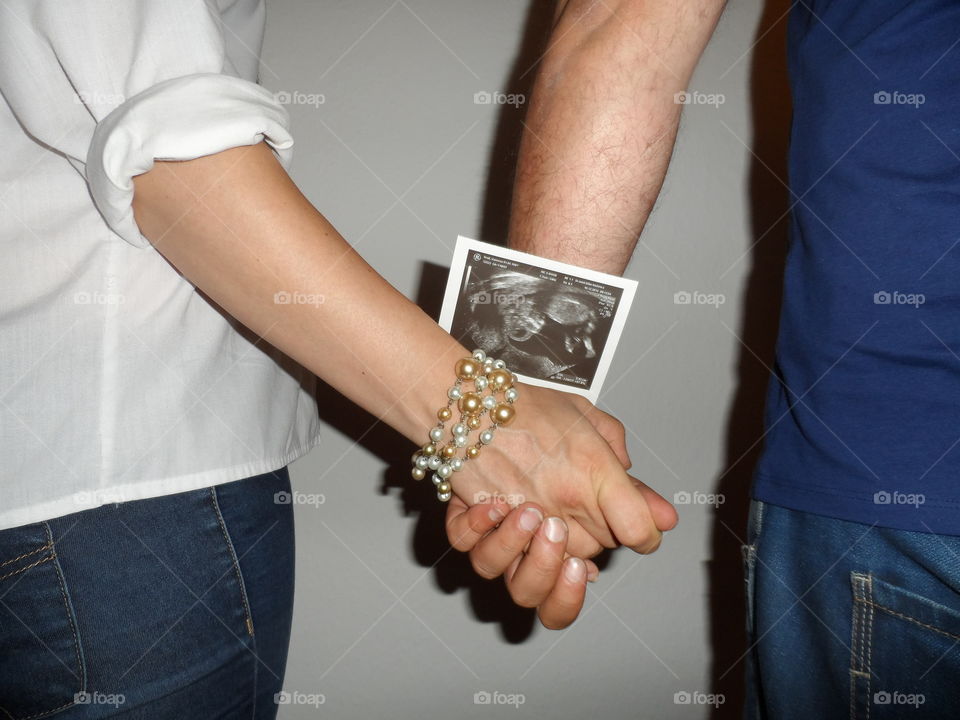 holding the future in our hand. Our ultrasound photos of our baby