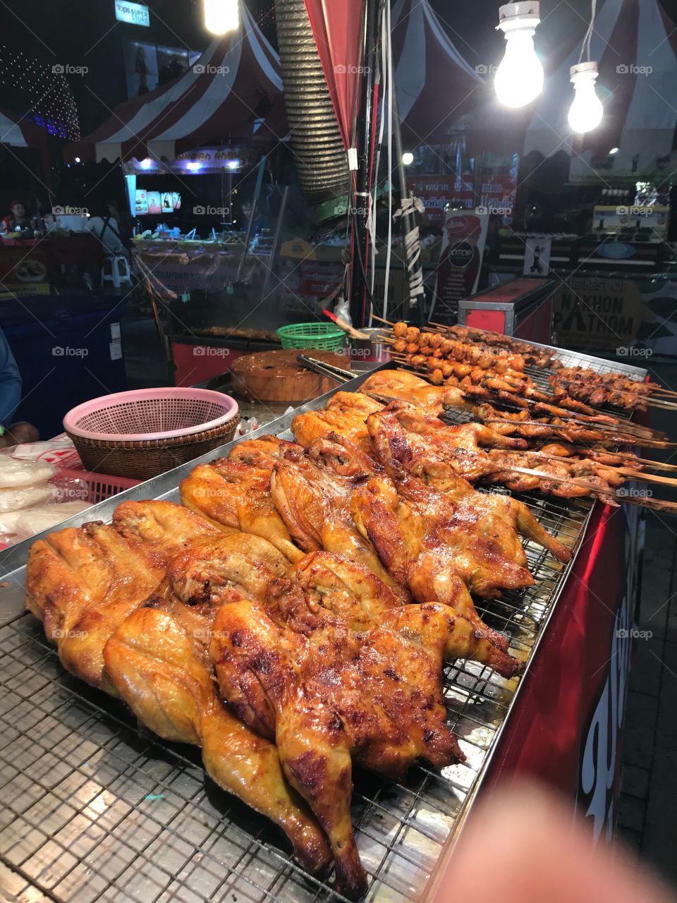 Grilled chickens in the market