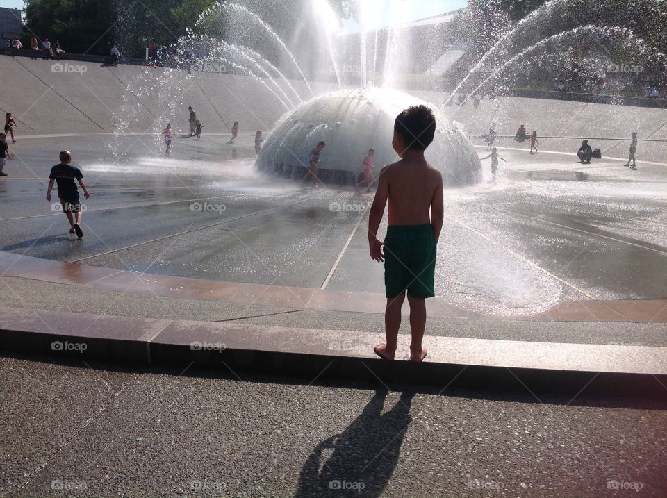 Seattle Fountain Fun. Picture of my son in front of the fountain at the Seattle Center