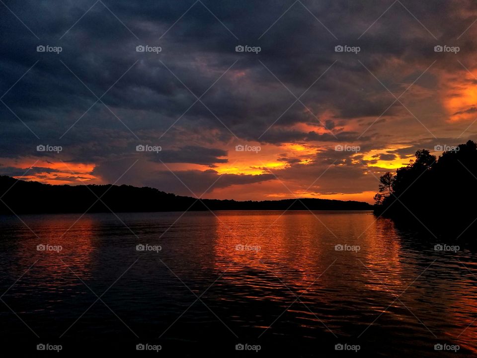 red sunset over lake